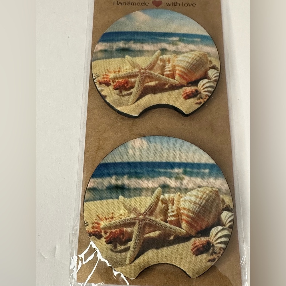 This is a set of 2 custom-made neoprene “beach” car coasters.